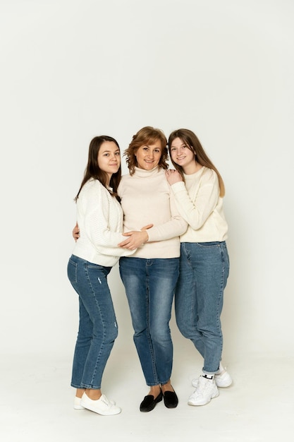 Three girls on a white background