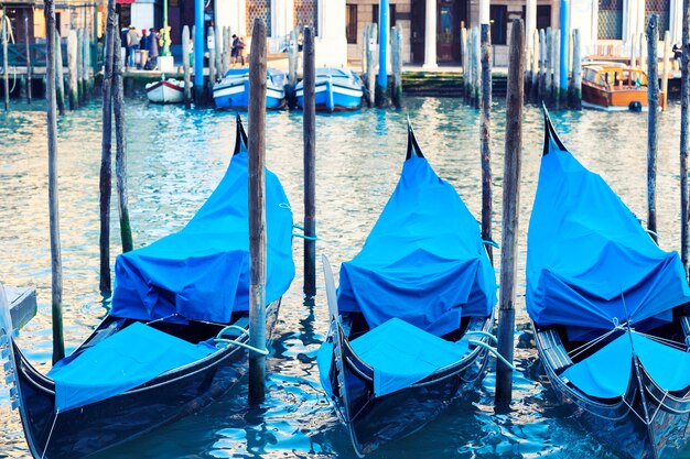 Three gondolas in Venice, Grand Canal, Italy.