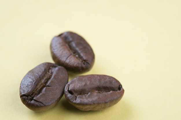 three grains of roasted coffee