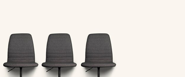 Three gray office chairs on a light background. Place for your text. Banner.