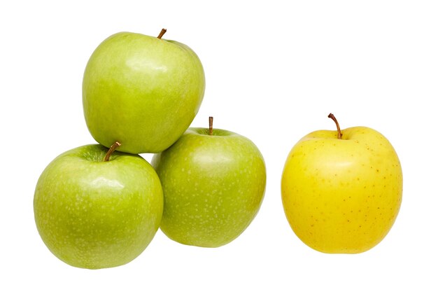 Three green apples and one yellow on a white background