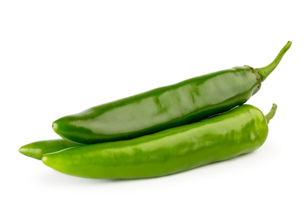 Three green peppers isolated