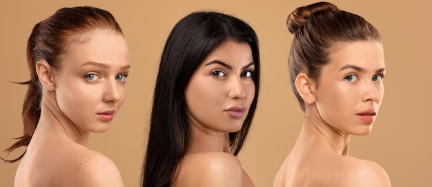 Three halfnaked young women posing on beige skin care concept