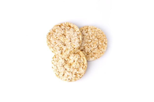 Three healthy puffed rice cakes isolated on white background