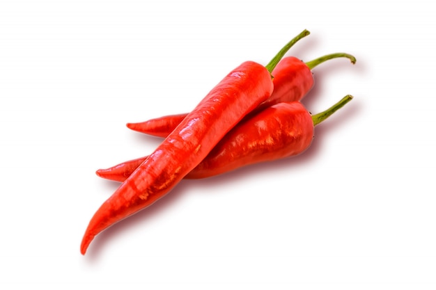 Three hot chilly pepper on the white