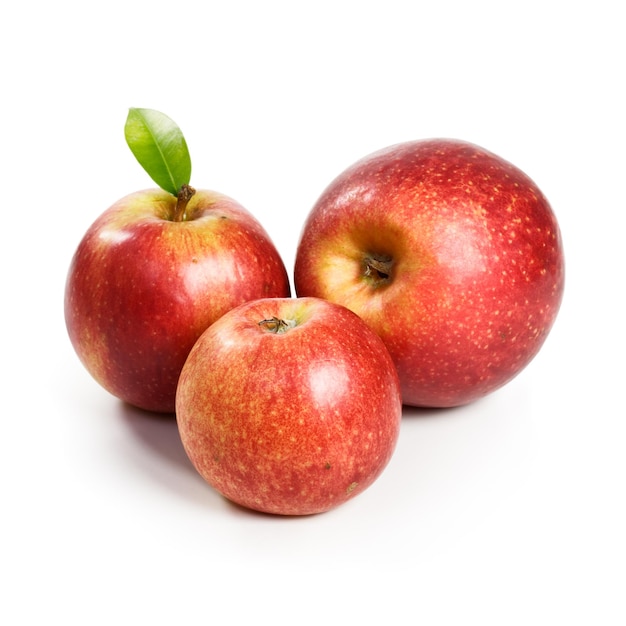 Three Jonagold apples on white background