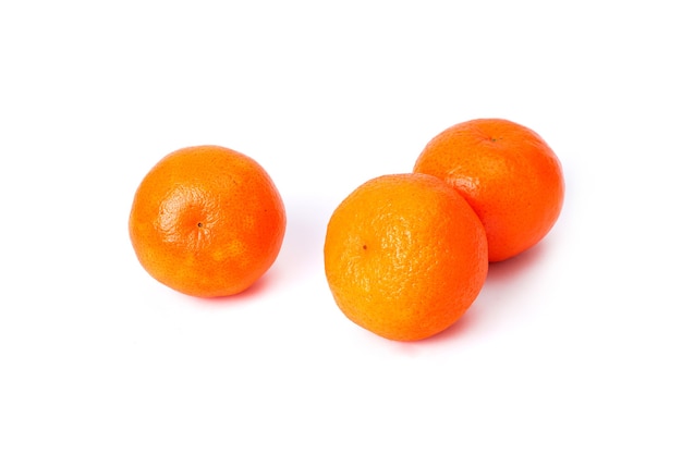 Three juicy orange tangerine, citrus, on a white background.