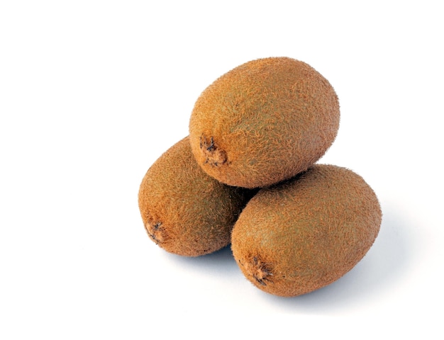 Three kiwi fruits on a white background