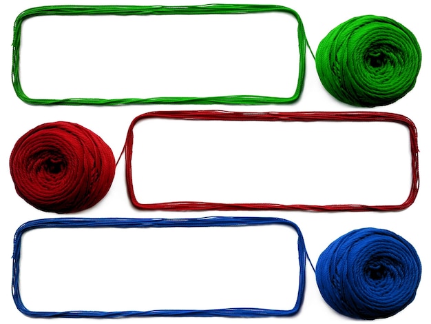 Three of knitting yarn on white background