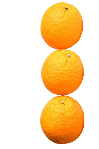 Three large identical oranges lie in a row on a white background