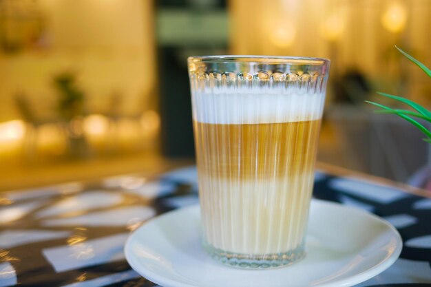 Three layer of cup of coffee on table