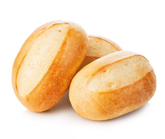 Three loaves of fresh homemade bread closeup isolated on a white background