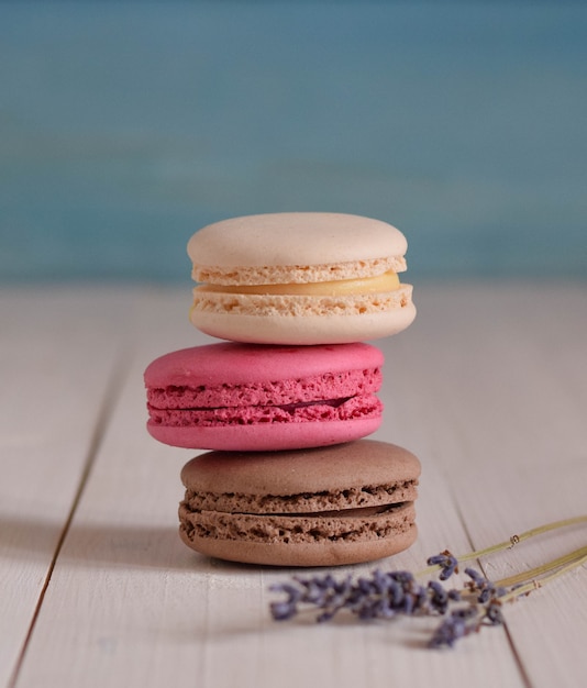 Three macaroons on the wood light table