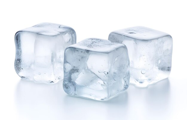 Photo three melting ice cubes on white background