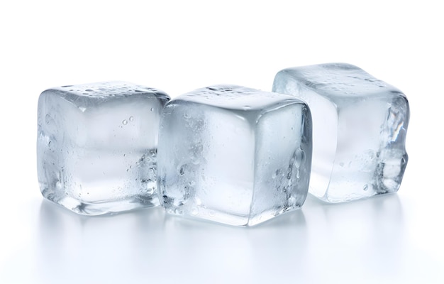 Photo three melting ice cubes on white background