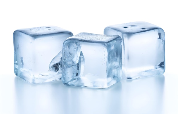 Photo three melting ice cubes on white background