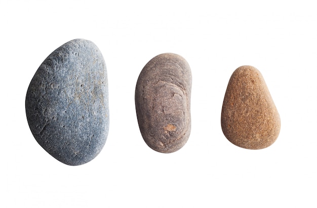 Three oval colored pebbles
