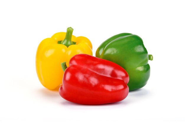 Three perfect bell peppers isolated on a white background in closeup high details