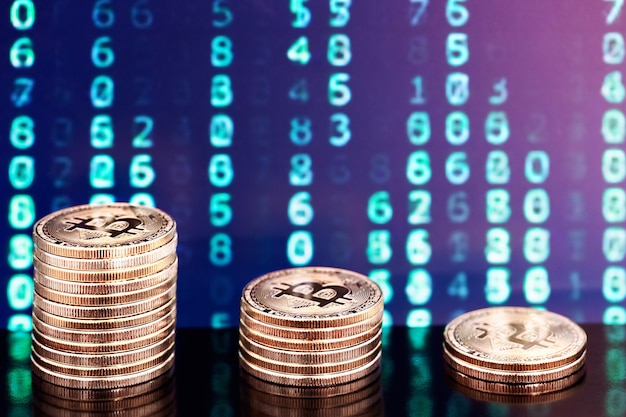Three piles of bitcoins with numbers in backgrounds