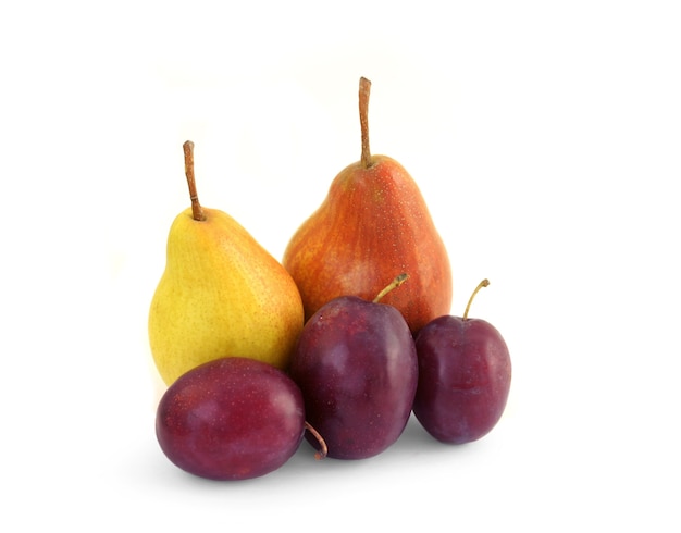 Three plums and two pears on a white background