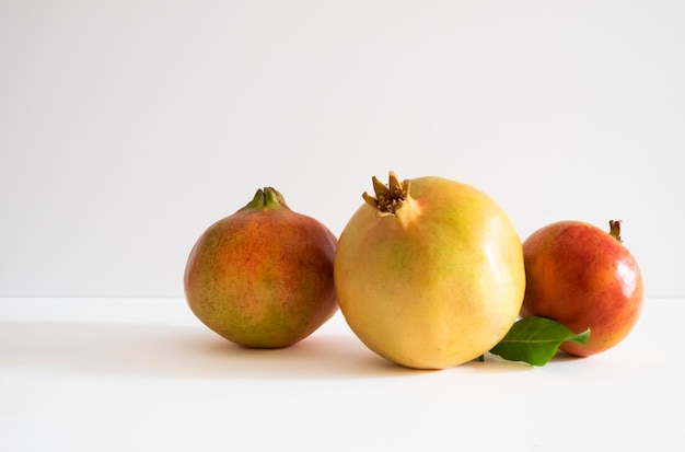 Three pomegranate isolated on the white background