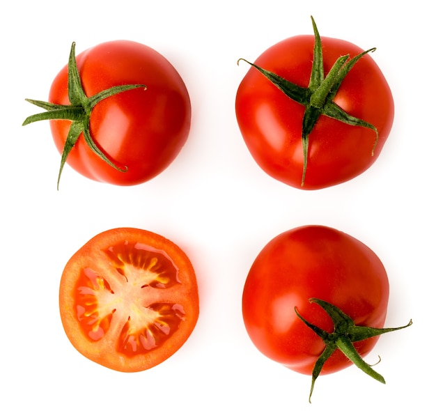 Three ripe tomatoes and half on white