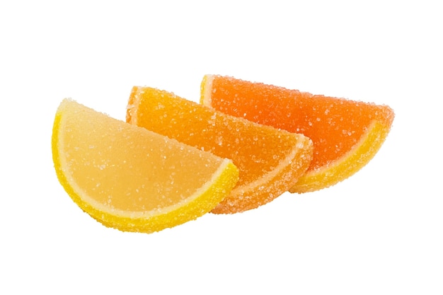 Three slices of  marmalade lying one on another on a white back