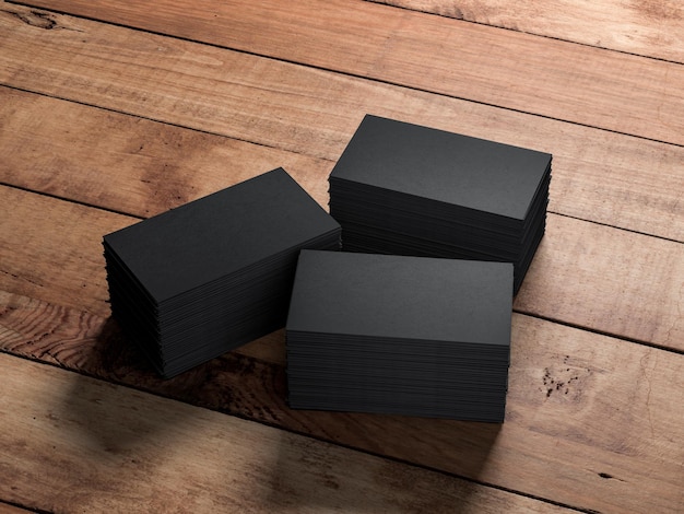 Three Stacks of black business cards on wooden table background. 3d rendering