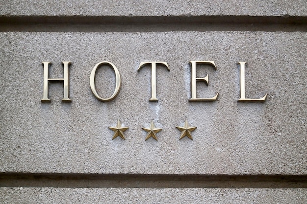 Three stars hotel sign