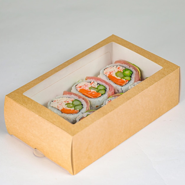 Three Sushi Rolls in Cardboard Box