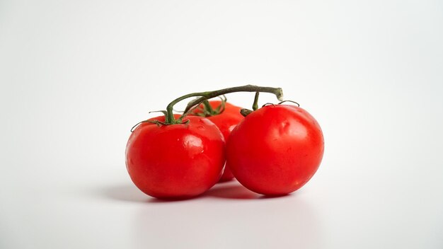 Three of Tomato branch isolated on white background