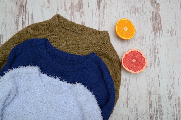 Three warm sweater, orange and grapefruit.