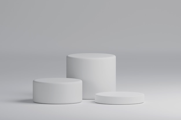 Three white cylinder product stage podium background