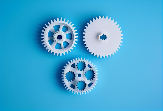 Three white gears or cogwheels on blue background with copy space modern minimal management team process or industry concept templateGenerative AI
