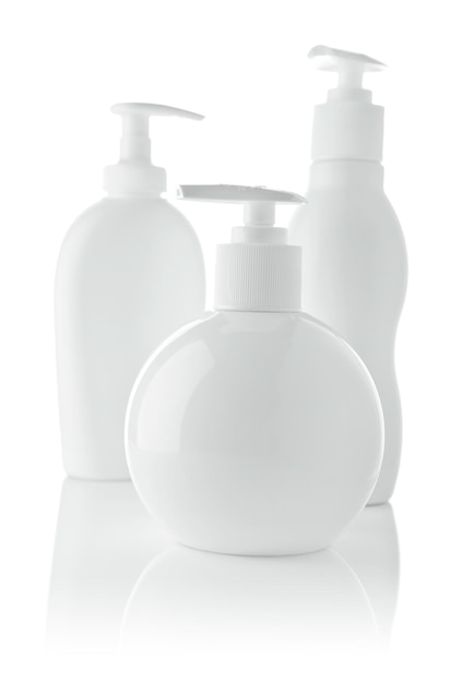 Three white spray bottles