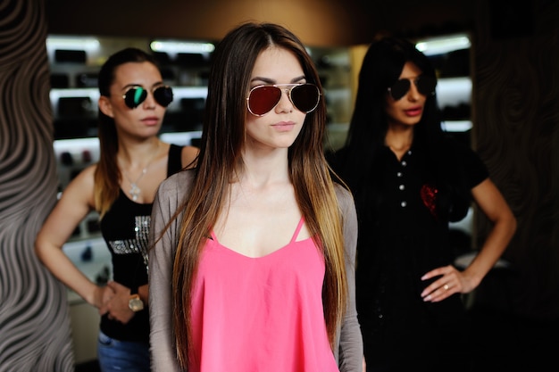 Three women in sunglasses