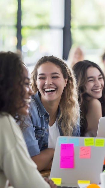 Three young women laughing together in a cafe