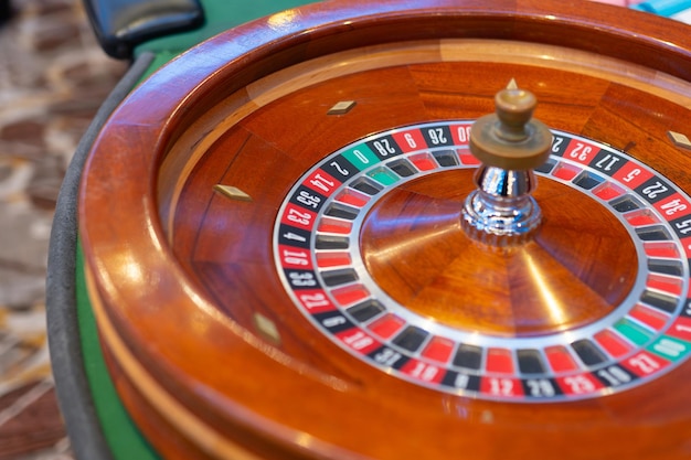 Thrilling casino moment the classic roulette wheel spins on an elegant table capturing the excitem