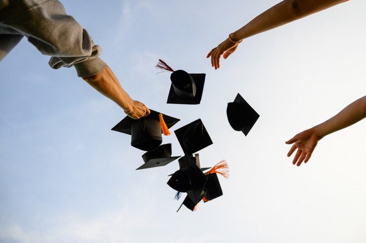 Throw a black hat of graduates in the sky.
