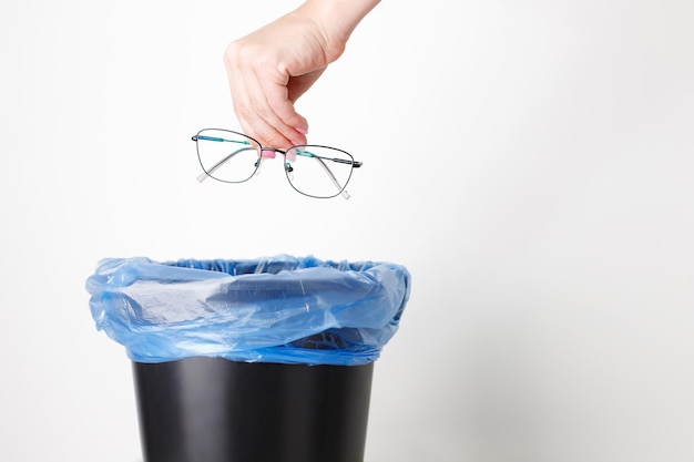 Throwing glass in the trash vision correction