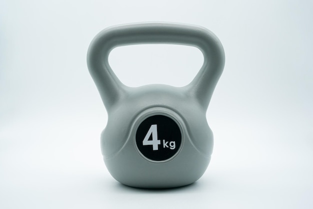 Thuisgymconcept met kettlebells en dumbbells