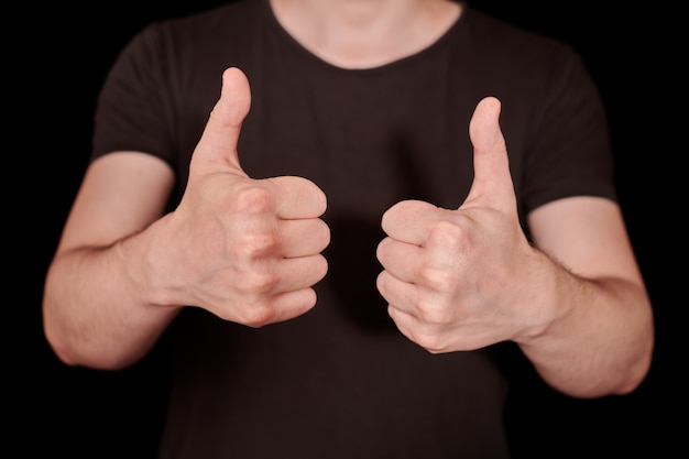 Thumbs up signal man hand gesture