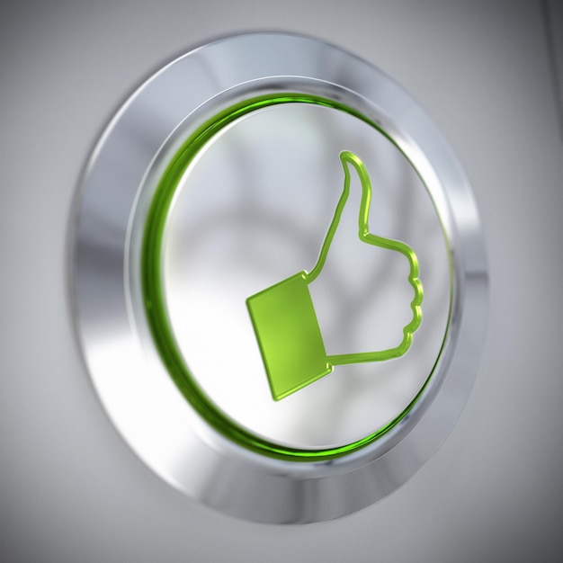Pollice in su simbolo su un pulsante di metallo, colore verde e luce, come il concetto