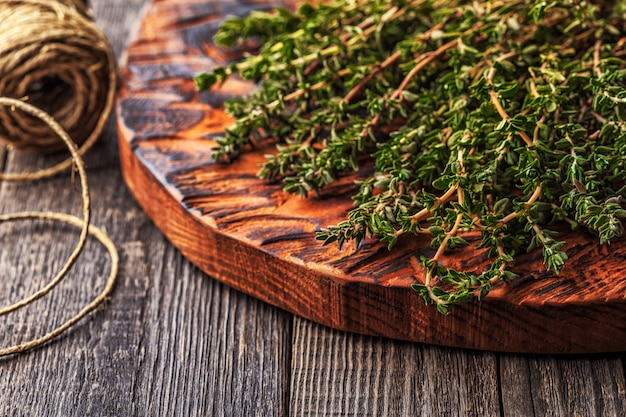 Thyme on an old wooden board