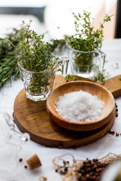 Thyme and Sea salt on the wooden board