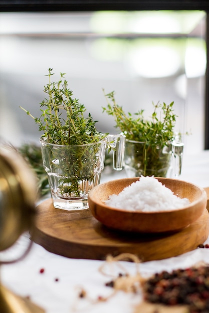 Thyme and Sea salt on the wooden board