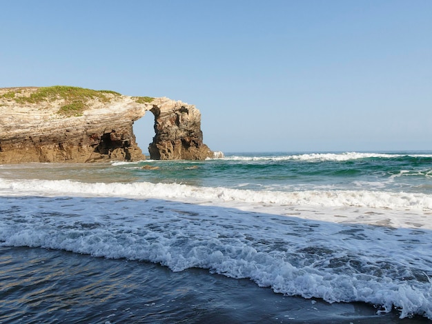 The tides come and go on the beach of the cathedrals, Lugo, Spain