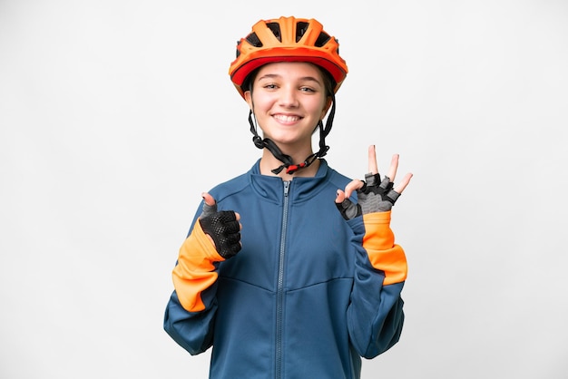 Tiener fietser meisje over geïsoleerde witte achtergrond met ok teken en duim omhoog gebaar