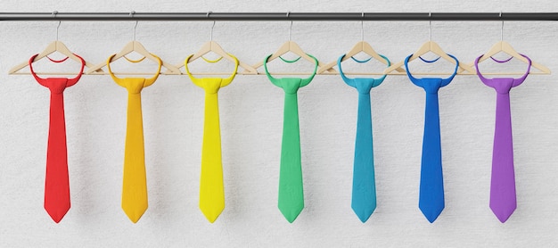 Ties hung on wooden hangers with rainbow colors