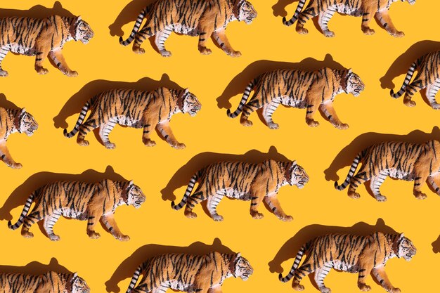 Tiger toys for kids on orange background